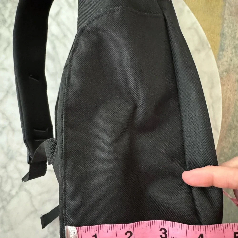 Black Backpack with 3 compartments for stuff NWOT 12x17x4